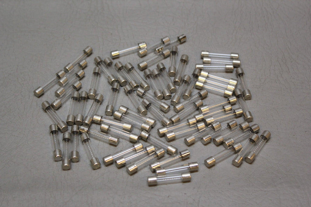 NEW LOT OF 68 BEL 3AG GLASS FUSES 240V